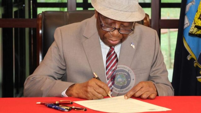 President_Boakai_signing