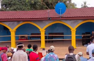 ‘Liberians Deserve the Best’: From Exile, Activist Martin Kollie Unveils Modern Multipurpose Bus Stop in Bomi
