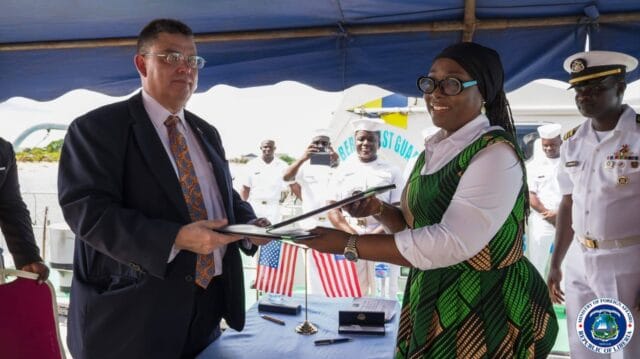 Foreign Minister Sara Beysolow-Nyanti and US Embassy Charge d'Affaires Joseph Zadrozy exchange the new shiprider agreement between both nations after they had signed