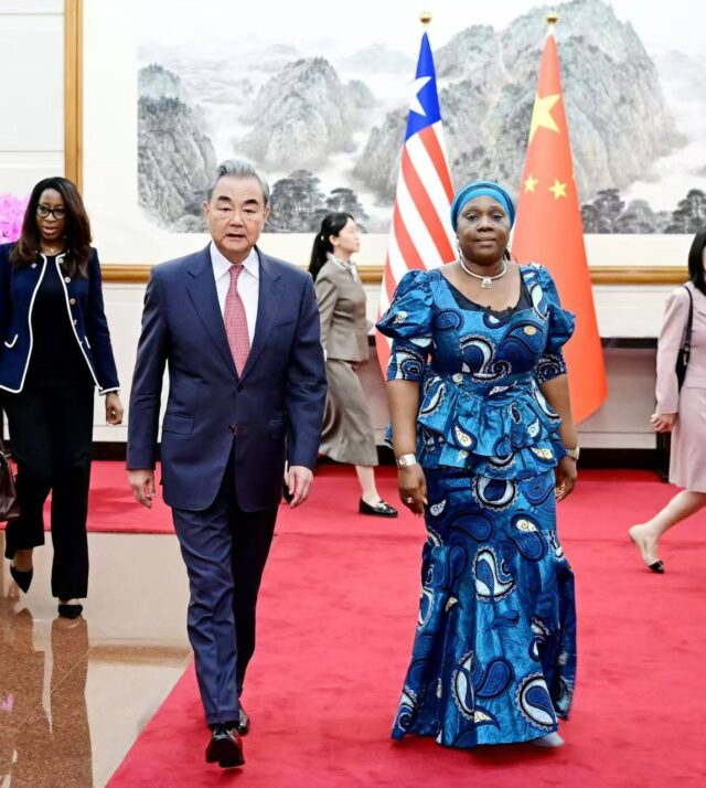 Foriegn Minister Sara Beysolow-Nyanti and Chinese Foriegn Minister Wang Yi