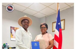Coach Wellay T. Baar Returns Home After Completing Prestigious Coaching Program in Hungary Coach Wellay T. Baar shares certificate with Youth and Sports Cornelia Kruah